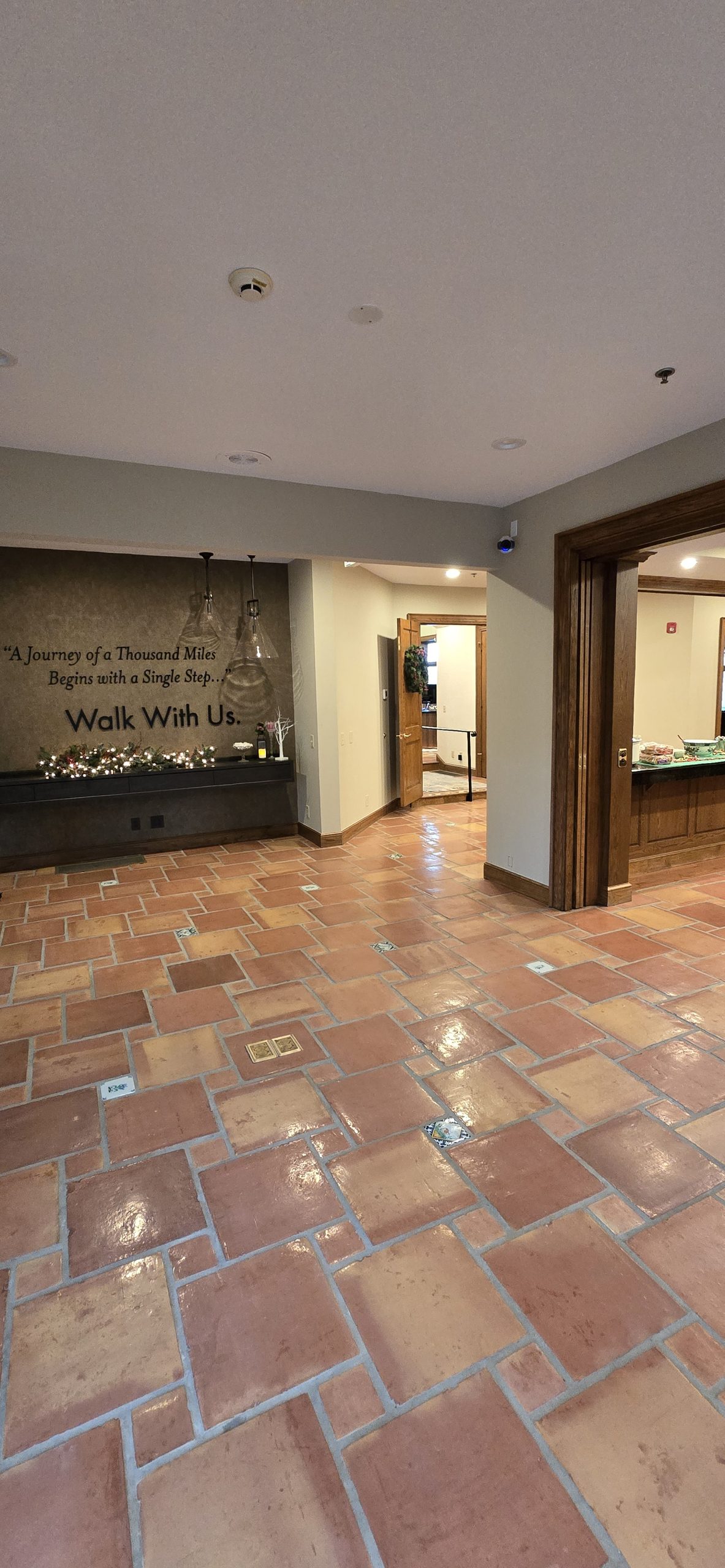 Lobby with tile floors and security camera installation