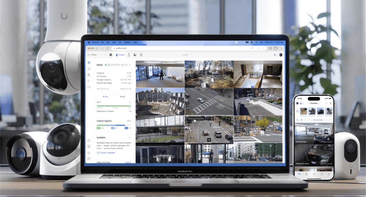 Laptop and smartphone showing security camera viewing and recordings