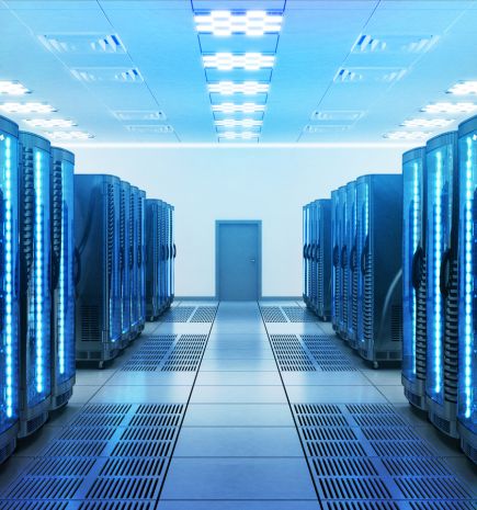 looking down hallway in a data center with server racks on each side